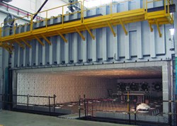 This huge oven (48 metres deep) will be used to heat treat the double pancakes at +650 °C. (Click to view larger version...)